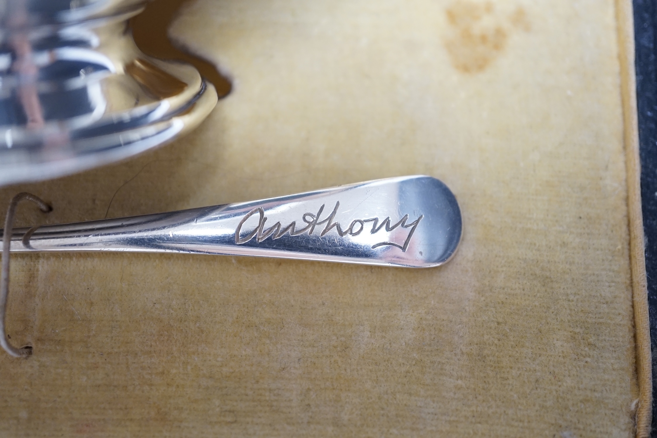 A George V cased silver christening bowl and spoon, Joseph Gloster Ltd, Birmingham, 1928/29, bowl diameter 92mm.